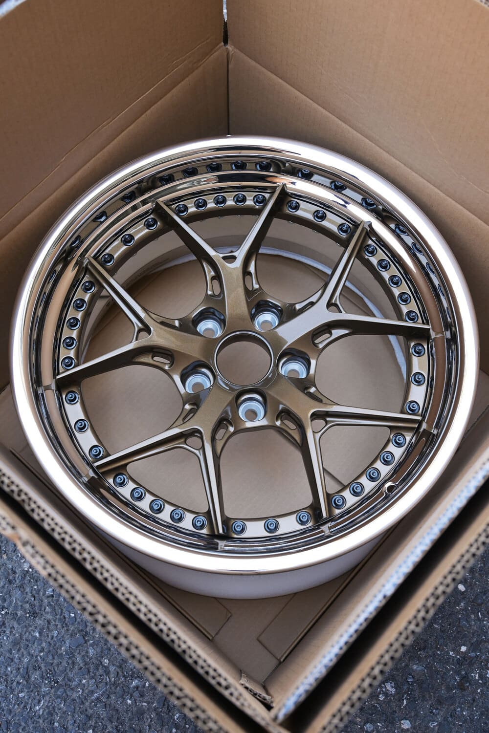 Front view of custom 1968 Camaro chrome deep dish wheel by RVRN