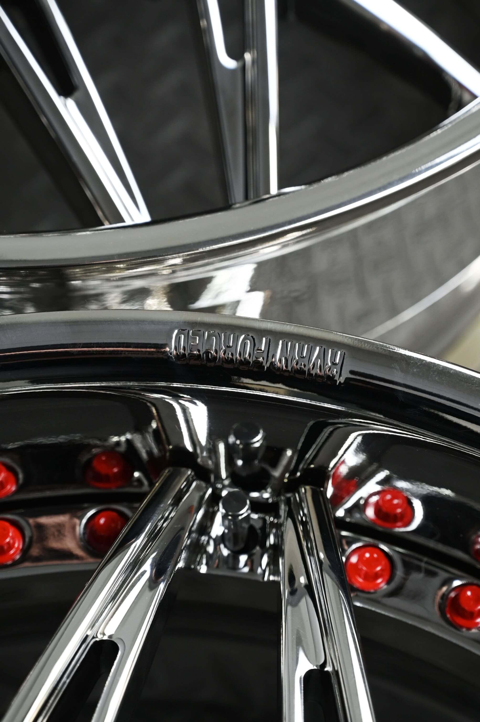 Custom center cap with RVRN logo on forged wheel for Camaro