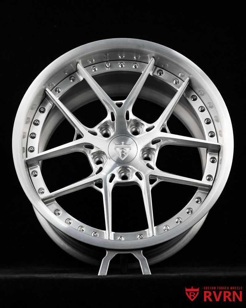 Close-up of RVRN branding on Corvette C4 custom wheels