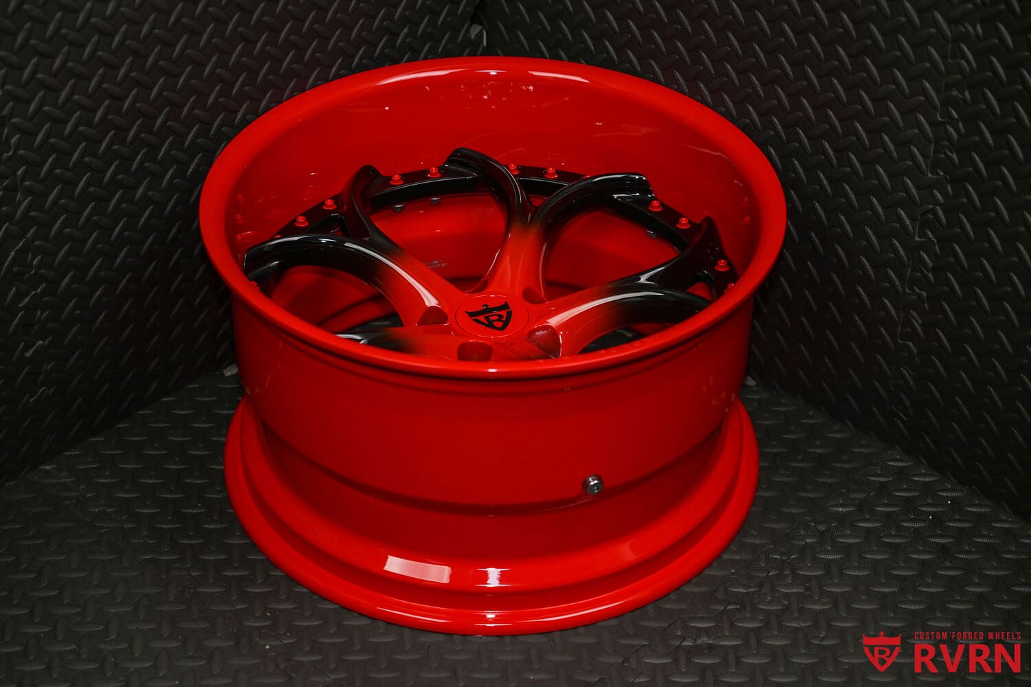 Gloss black fade to RVRN red spokes with red barrel