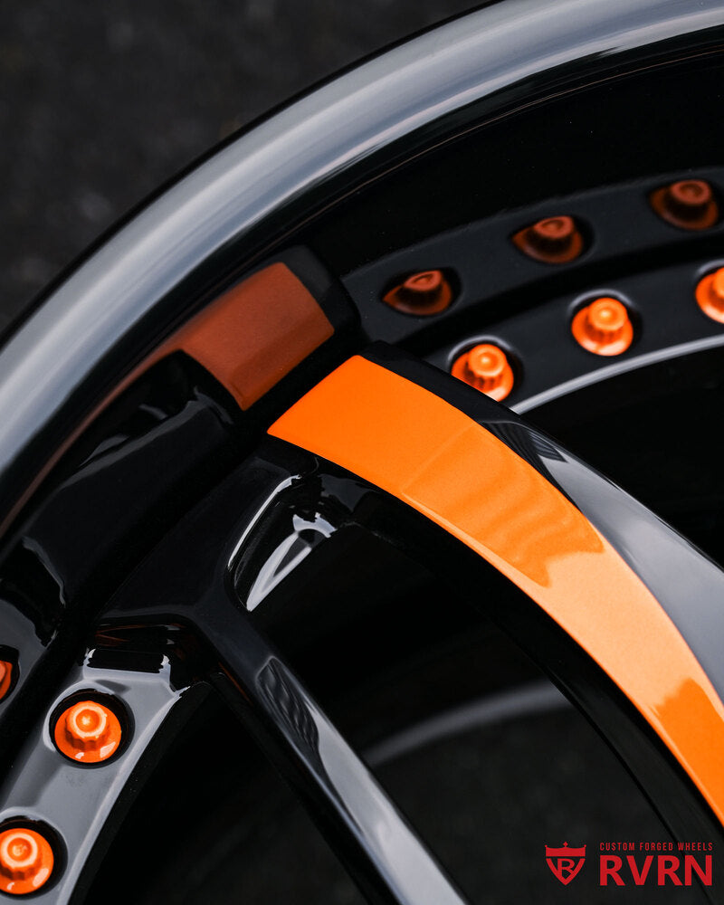 Gloss black barrel with Arancio Borealis spokes on custom forged wheel