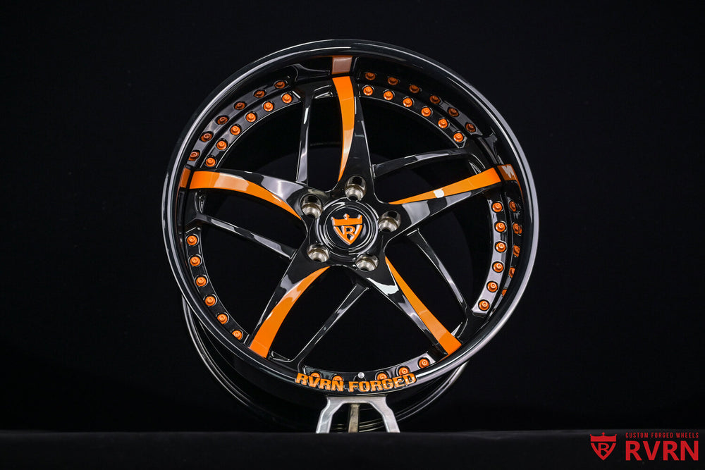 Close-up of RVRN RV-DC36D forged wheel with Lamborghini Orange and gloss black spokes