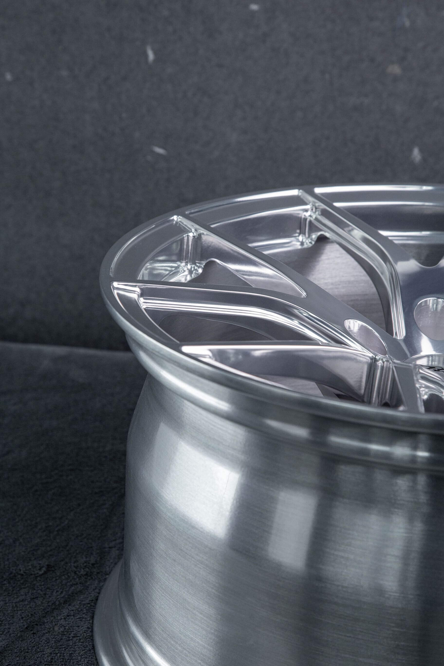 Forged aluminum structure of RV-MC24 wheels enhancing strength and performance.