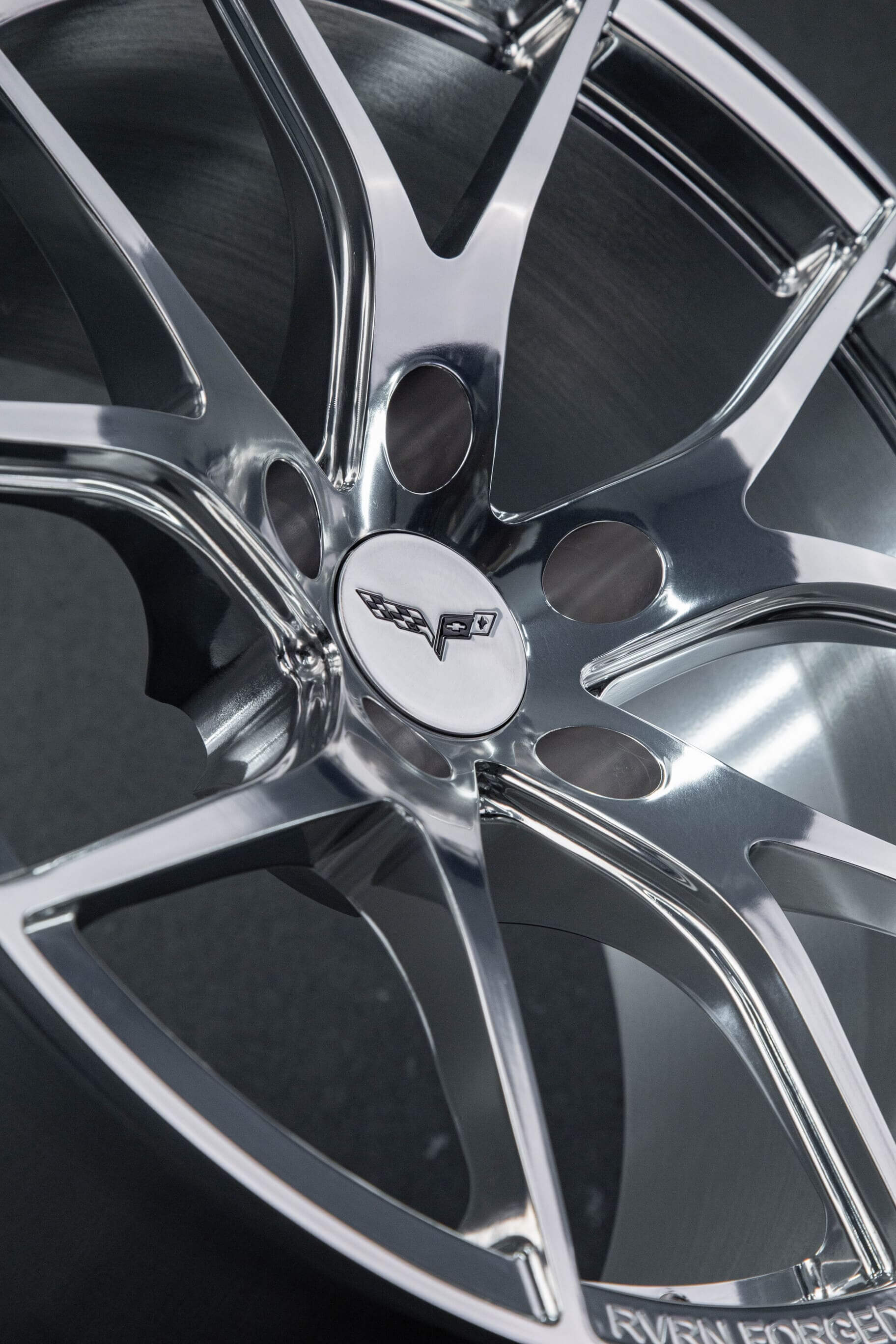 Precision-machined details of RV-MC24 polished forged wheels for custom C5 builds.