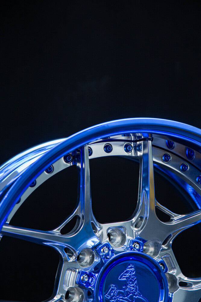 Custom 20x9 and 20x11 polished aluminum and blue chrome wheels for F250