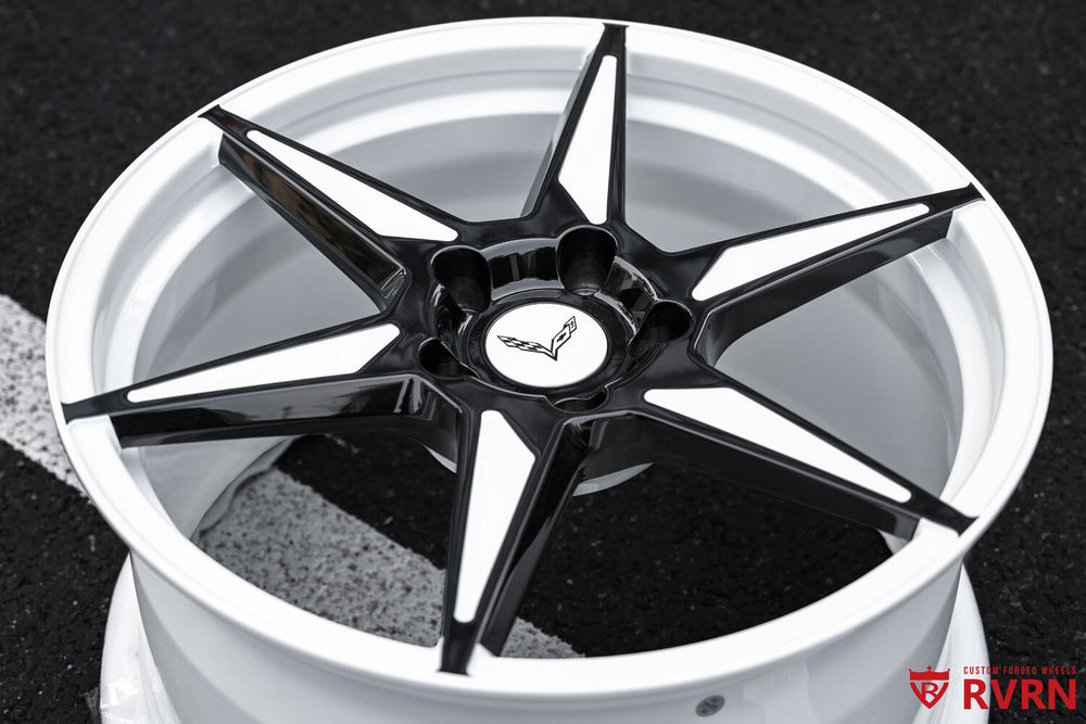 Close-up of RVRN RV-MC19 front wheel forged ivory white spoke gloss black insert
