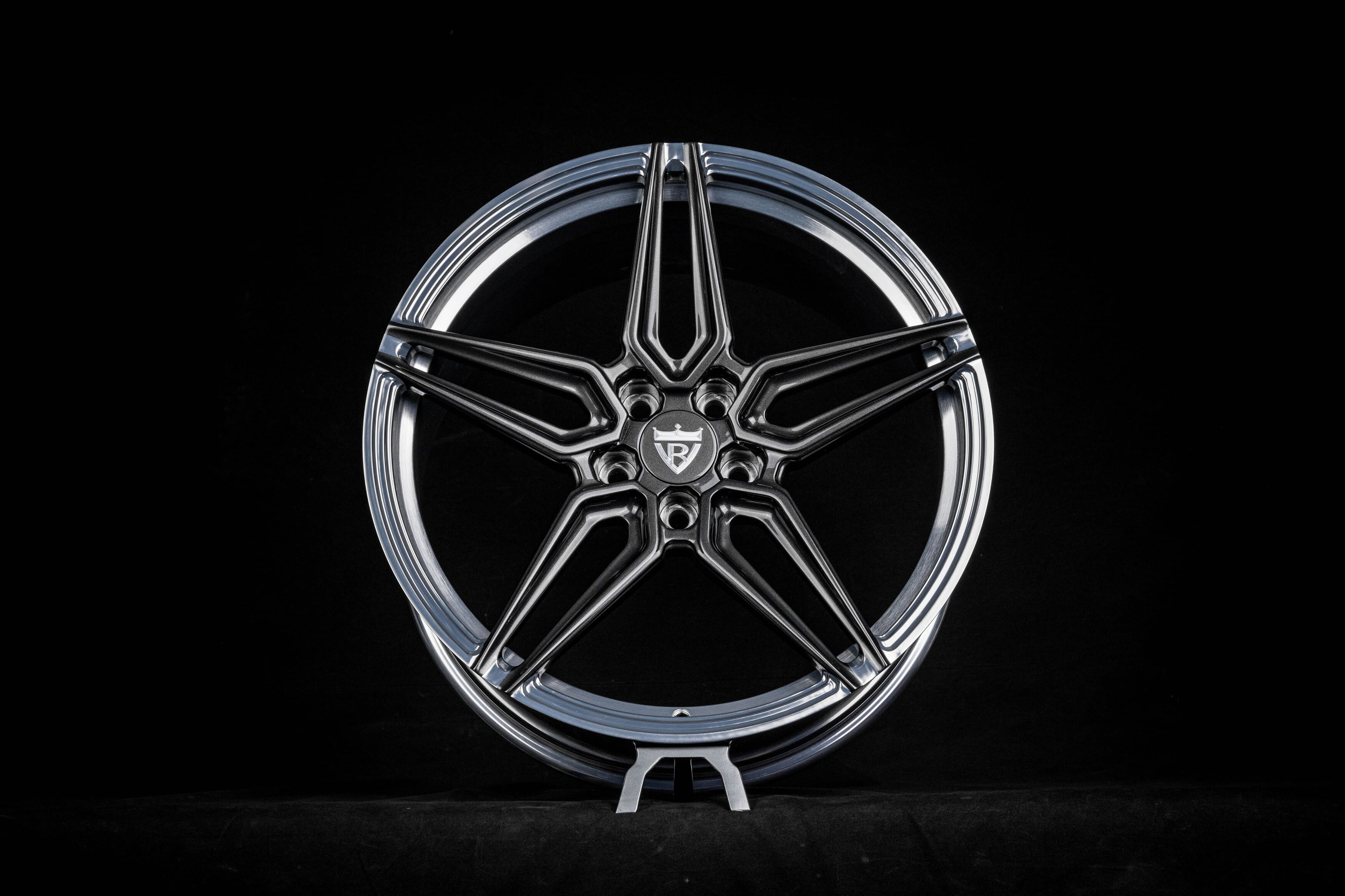 Close-up of custom lug nut fitment on forged wheels