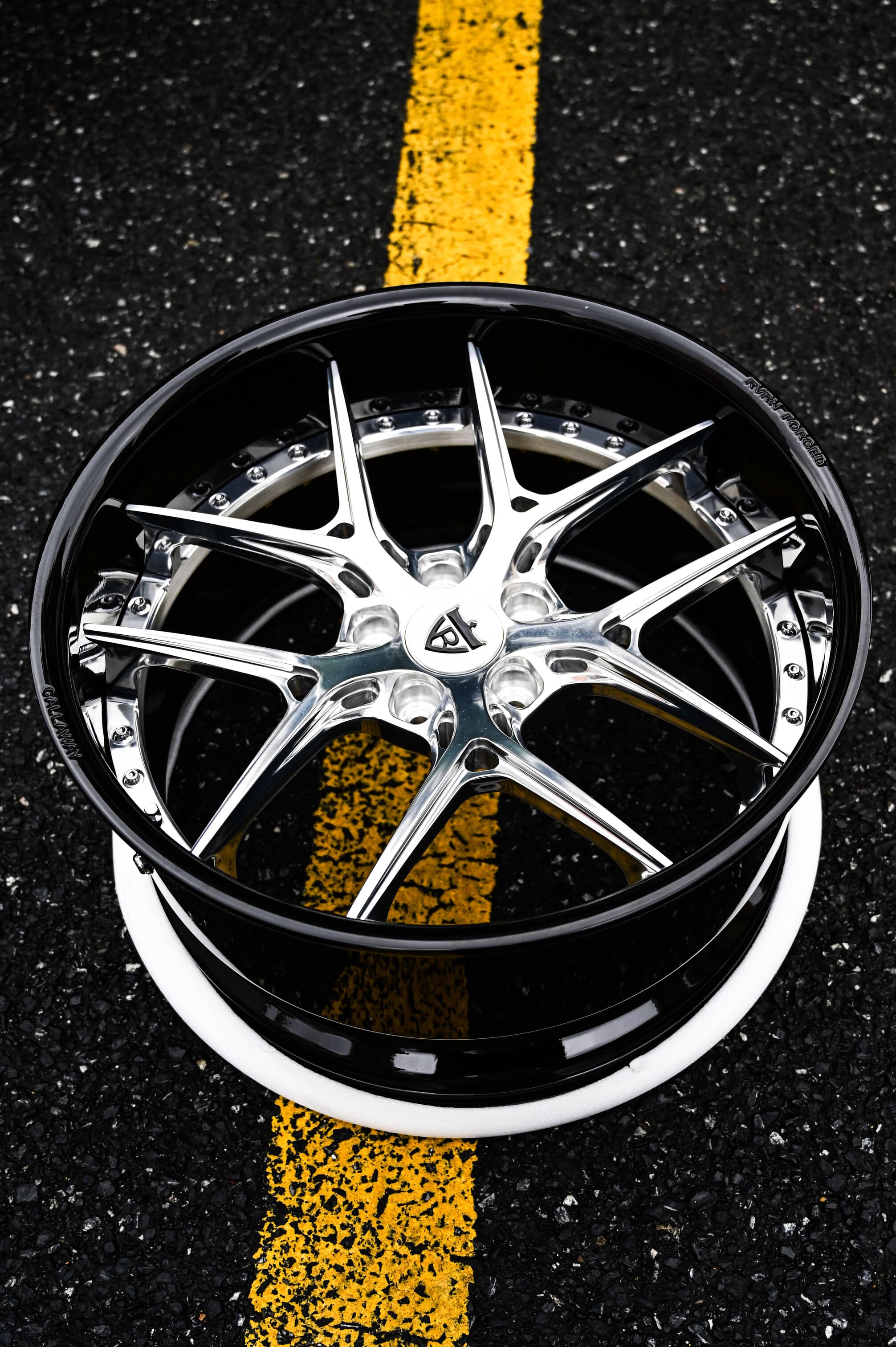 Front view of custom polished deep dish wheels on 2015 Maserati Granturismo