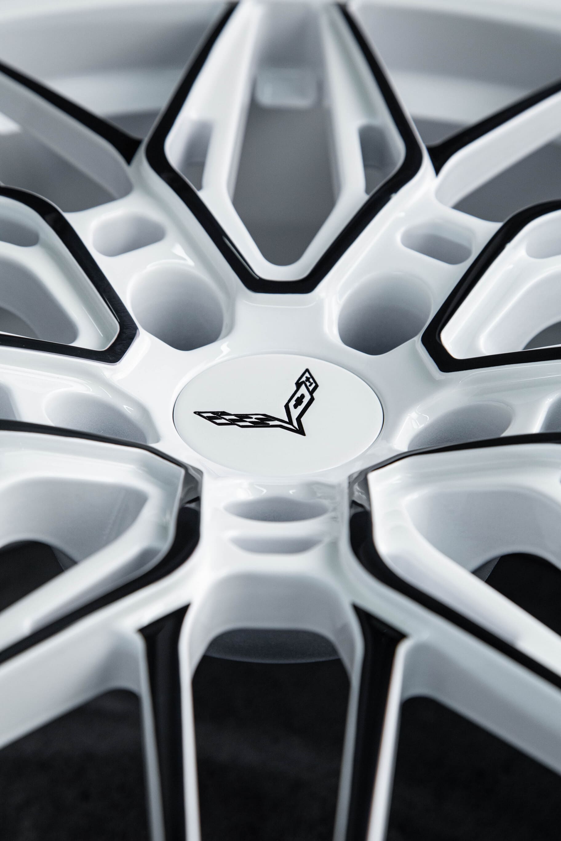 Detail view of contrasting black and white finish on RVRN forged wheels