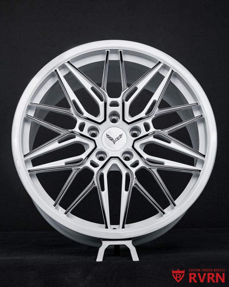 Close-up of white spokes and gloss black barrel custom forged wheels on Corvette C7