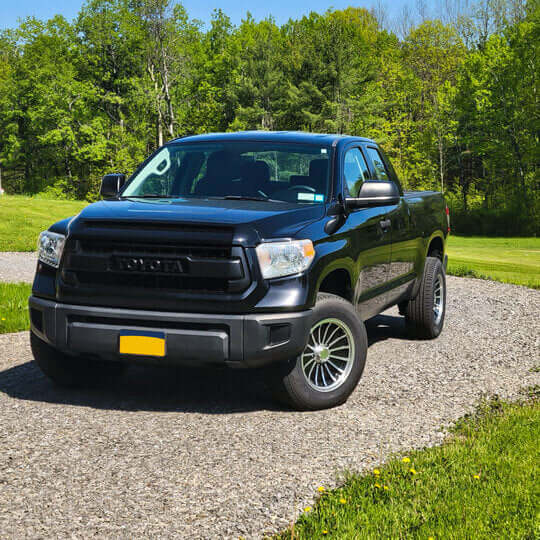 2016 Toyota Tundra with custom 18 inch gloss black forged wheels