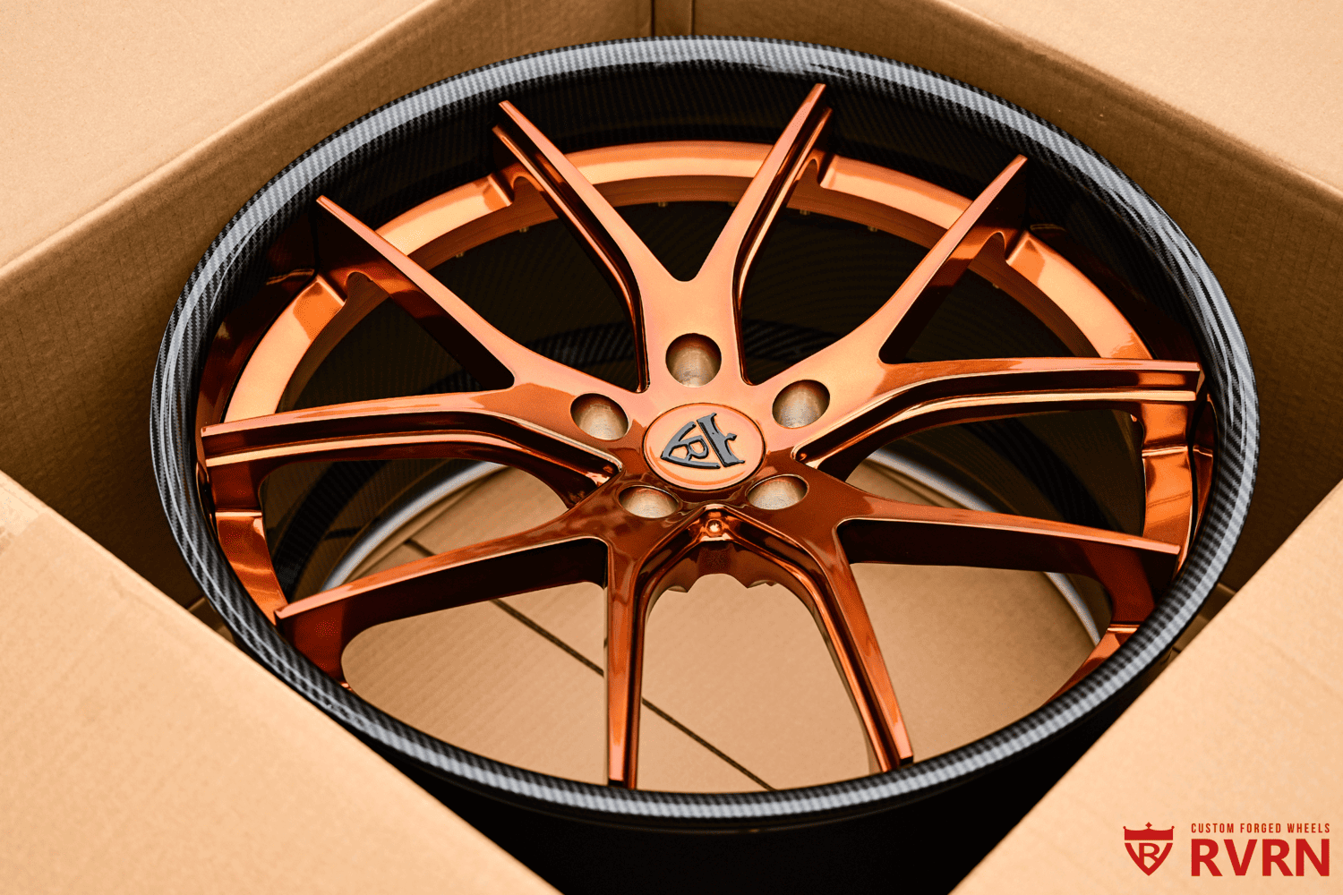 Side view of custom forged RV-DC24 wheels with carbon fiber details