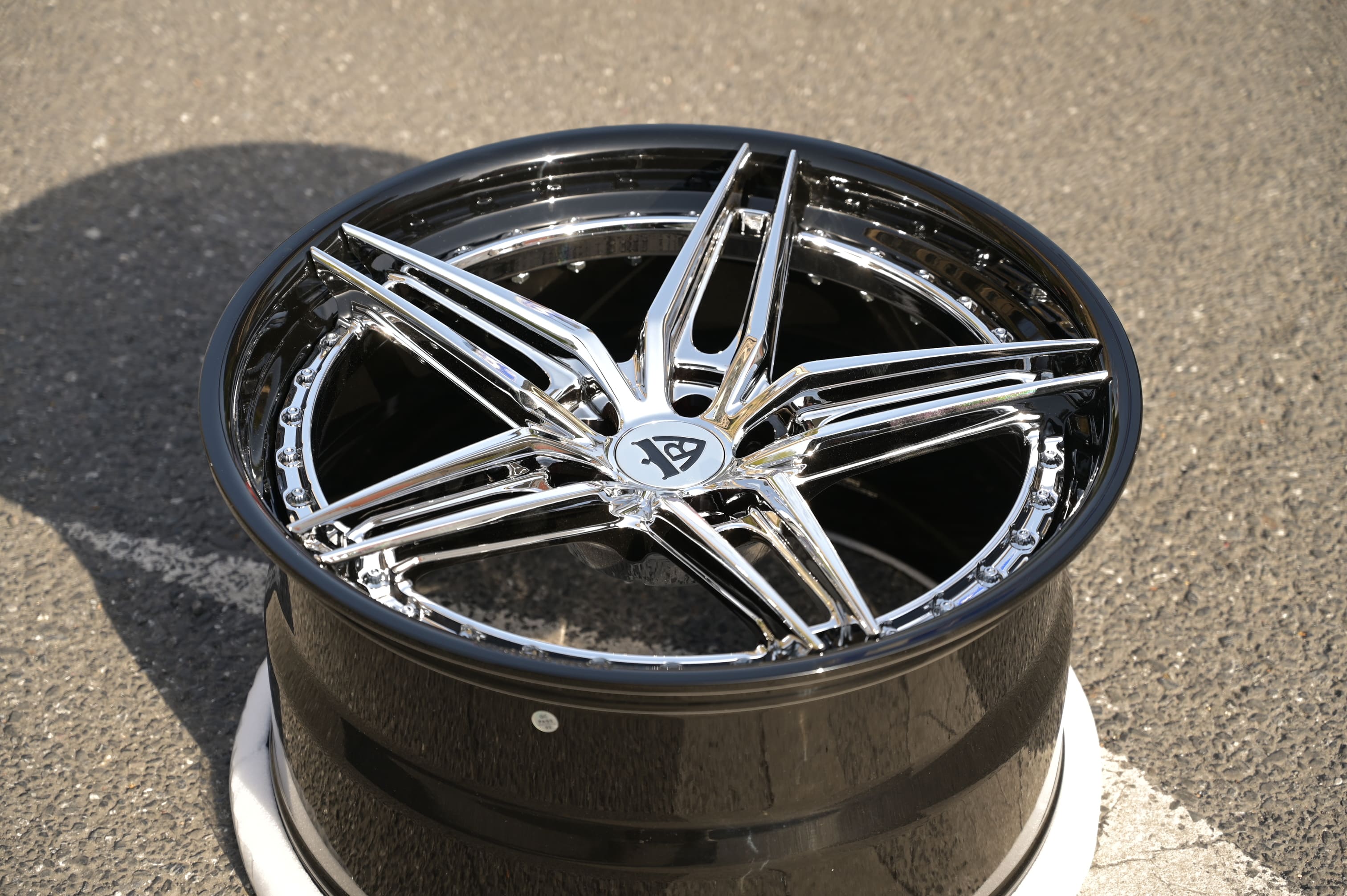 Front angle view of custom chrome 5 spoke RV-DP03 wheels on Corvette C7 Z06