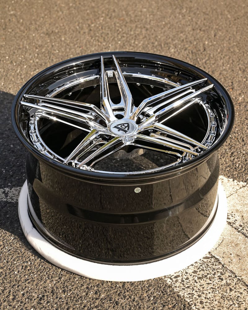 Detailed view of chrome 5 spoke design with forged finish