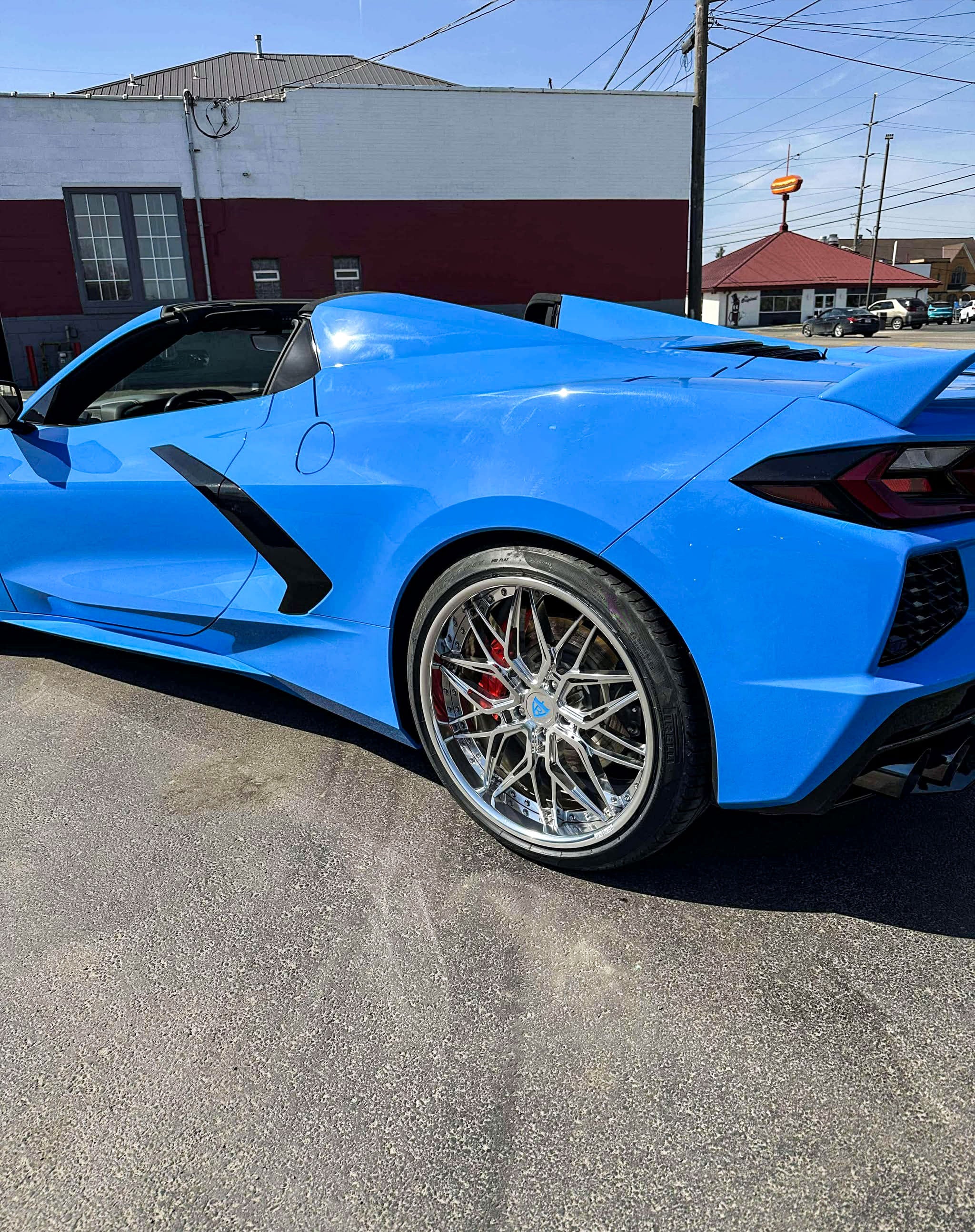 Rear view of RV-T081 21x12 forged polished wheels on Corvette C8