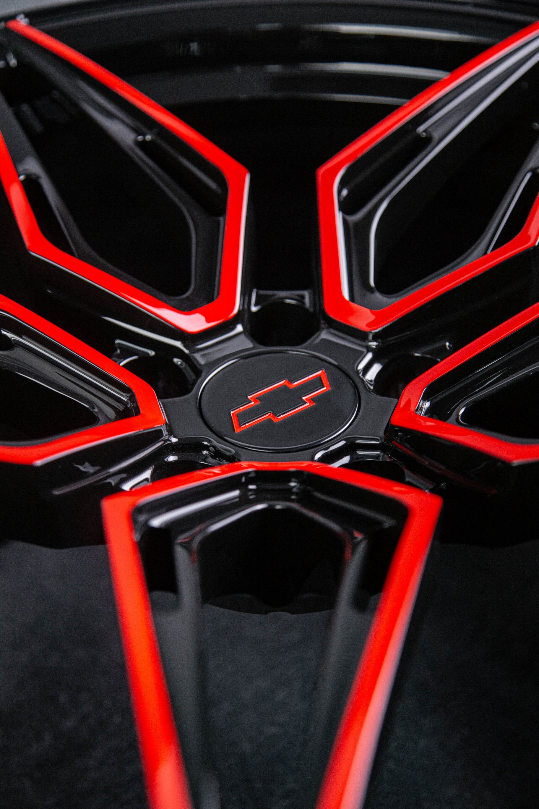 Red and black themed forged wheels installed on Camaro ZL1 – RVRN design