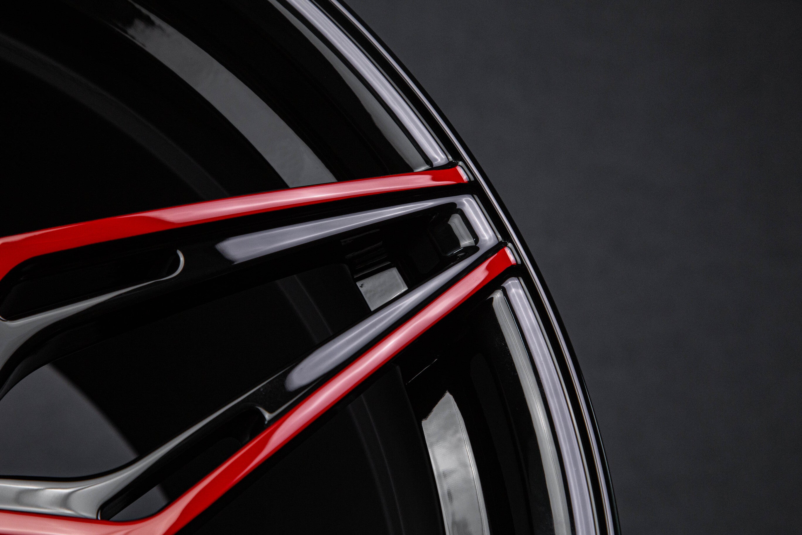Gloss black concave wheels angle view on 2023 Camaro ZL1