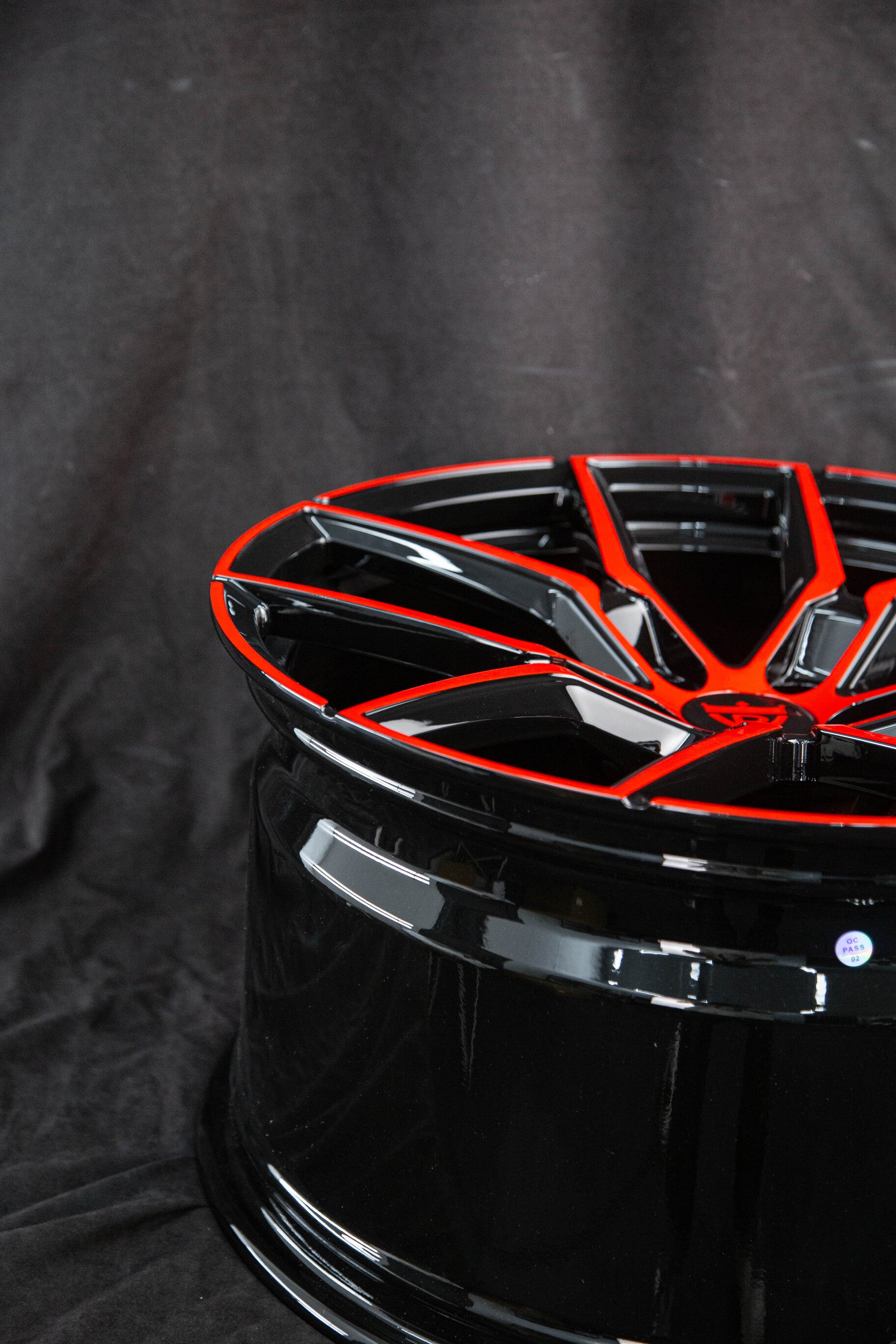 Detailed close-up of RV-MV1202 red and black forged wheel design