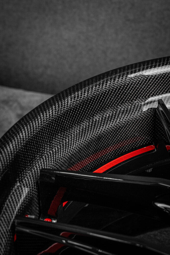 Angled top view of custom 22x10 RV-DR08D gloss black forged wheels