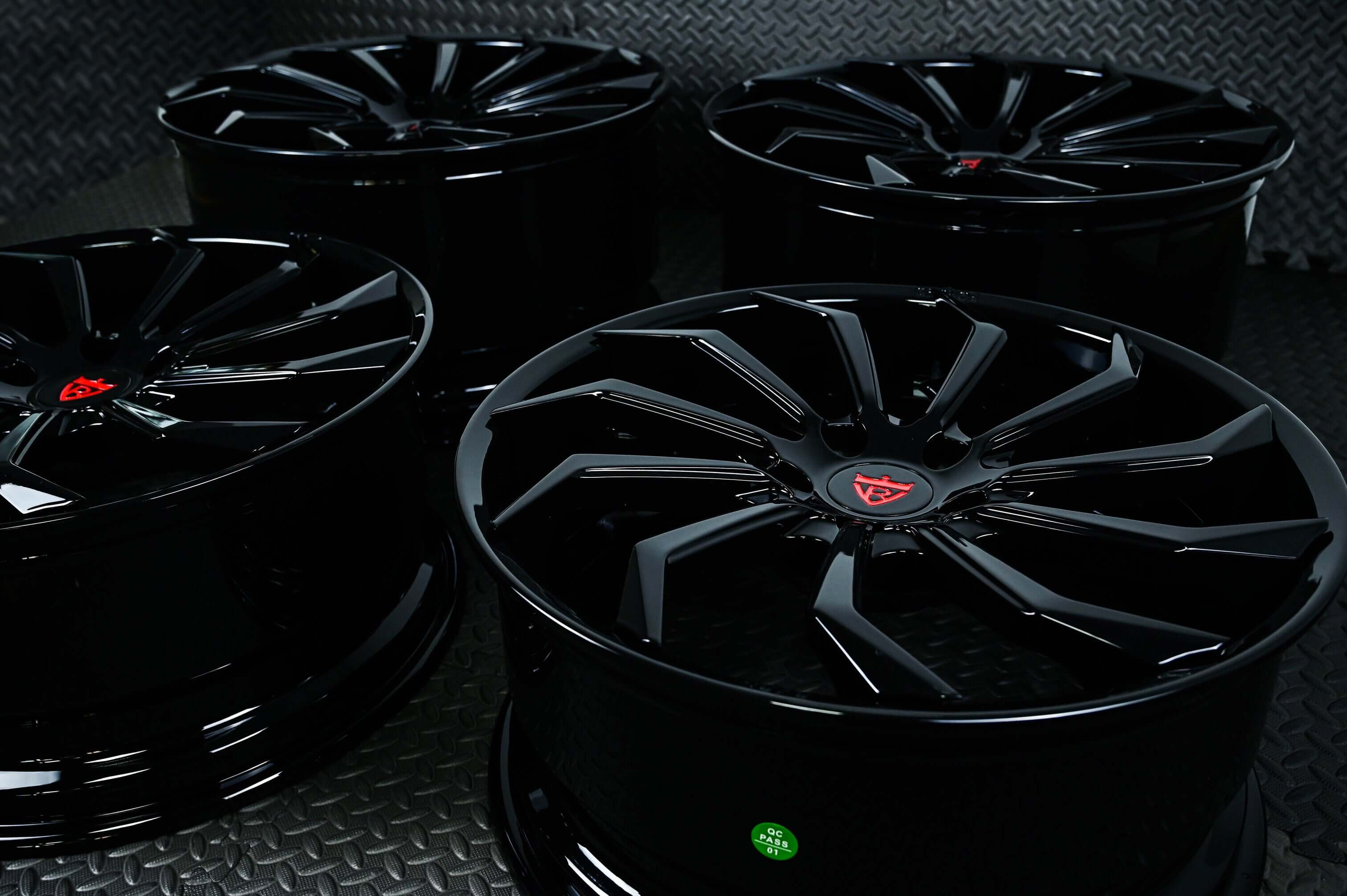 Angled view of C8 Corvette black wheels - showcasing aggressive spoke design