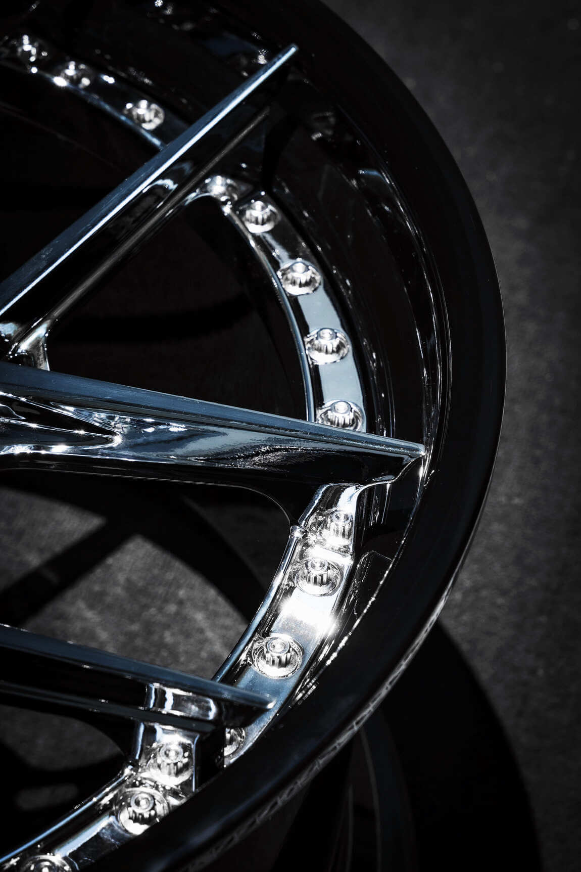Close-up of 2024 Corvette C8 Stingray RV-DR08 chrome black custom forged RVRN wheel detailing.