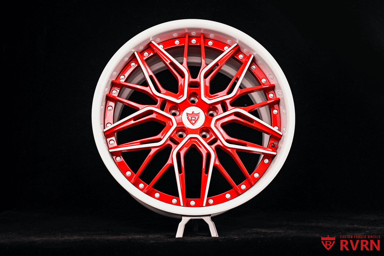 Front angle view of RV-T081 red and ivory white wheels on 2024 Corvette C8 Stingray