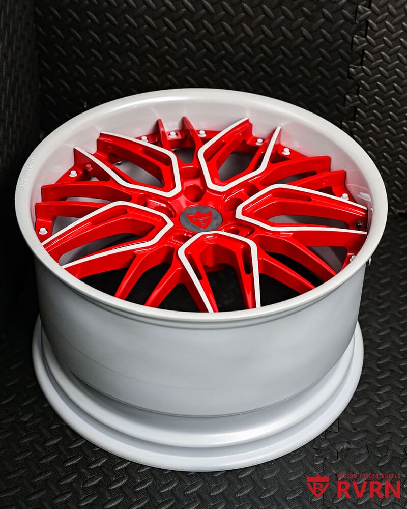Close-up of the ivory white face and red screws on RV-T081 wheels