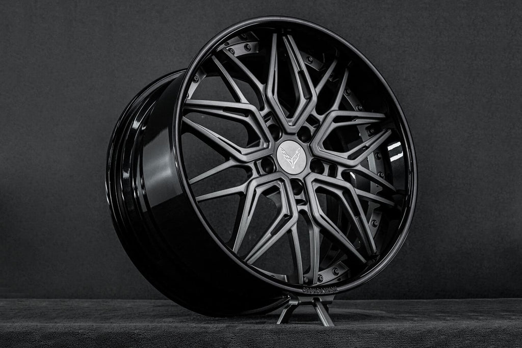 Custom matte gunmetal deep dish Corvette C8 wheel – angled front view