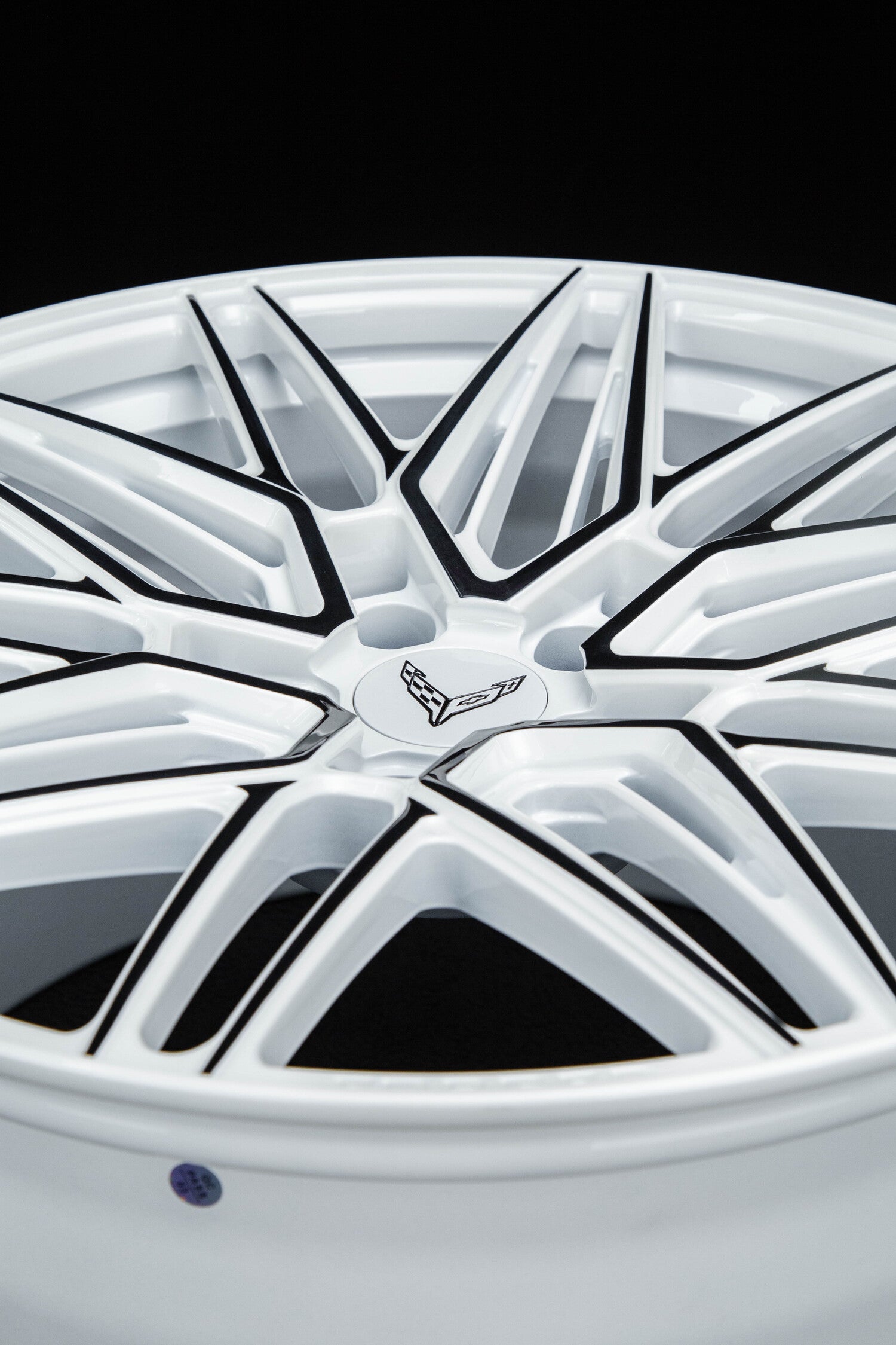Side profile of Corvette C8 Stingray with white and black RV-MS808 forged wheels