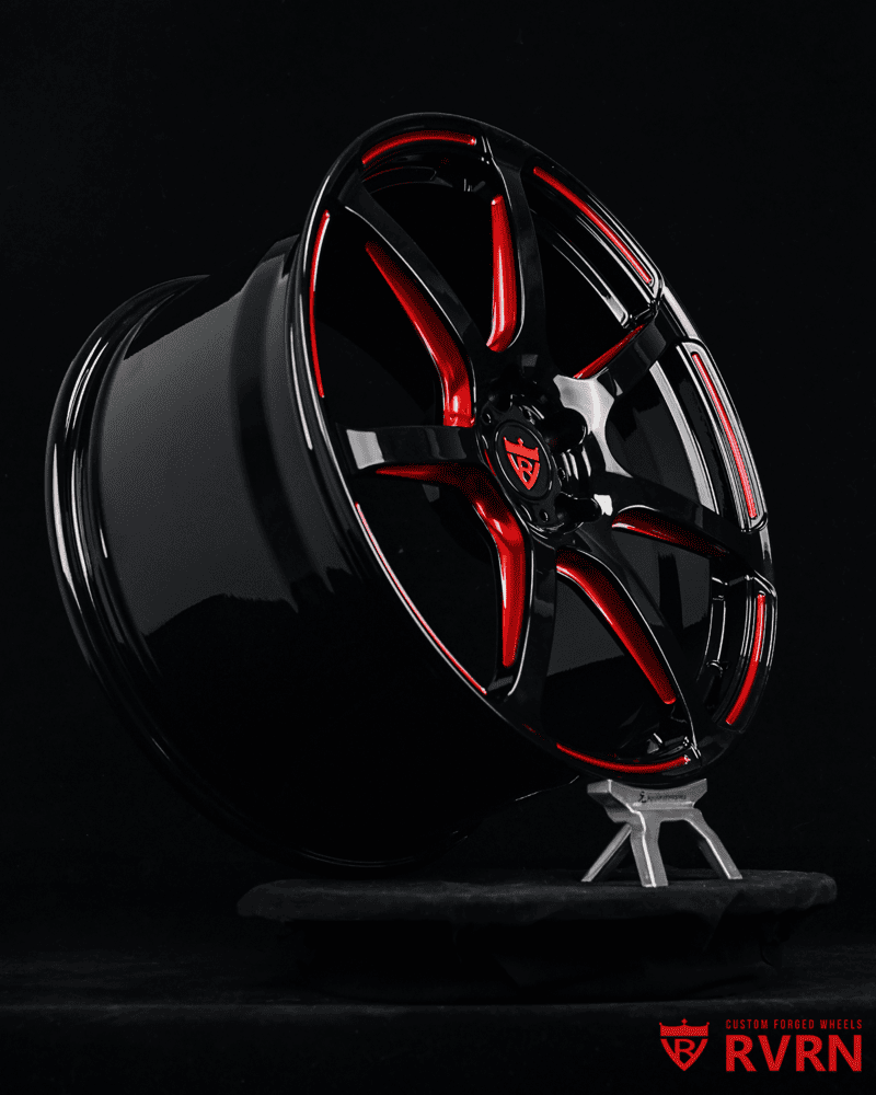 Corvette aftermarket wheels – bold black & red forged styling.