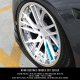 Custom forged 2-piece wheels on a 2018 Tesla Model 3, featuring gloss white spokes and polished aluminum barrel design.