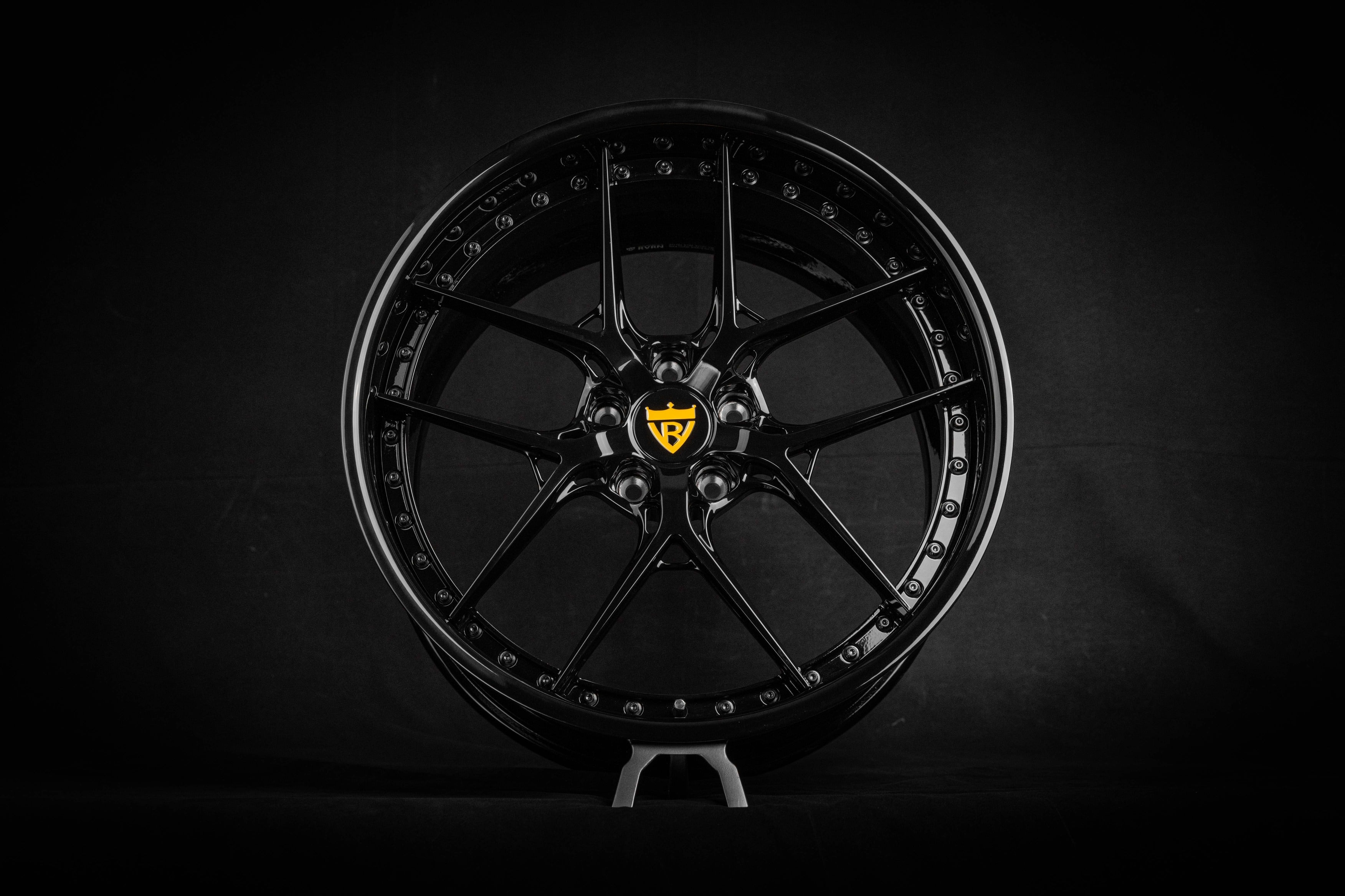 Corvette C8 Z51 RV-DR08 BLACK CUSTOM FORGED WHEELS from RVRN WHEELS on display in a dark room