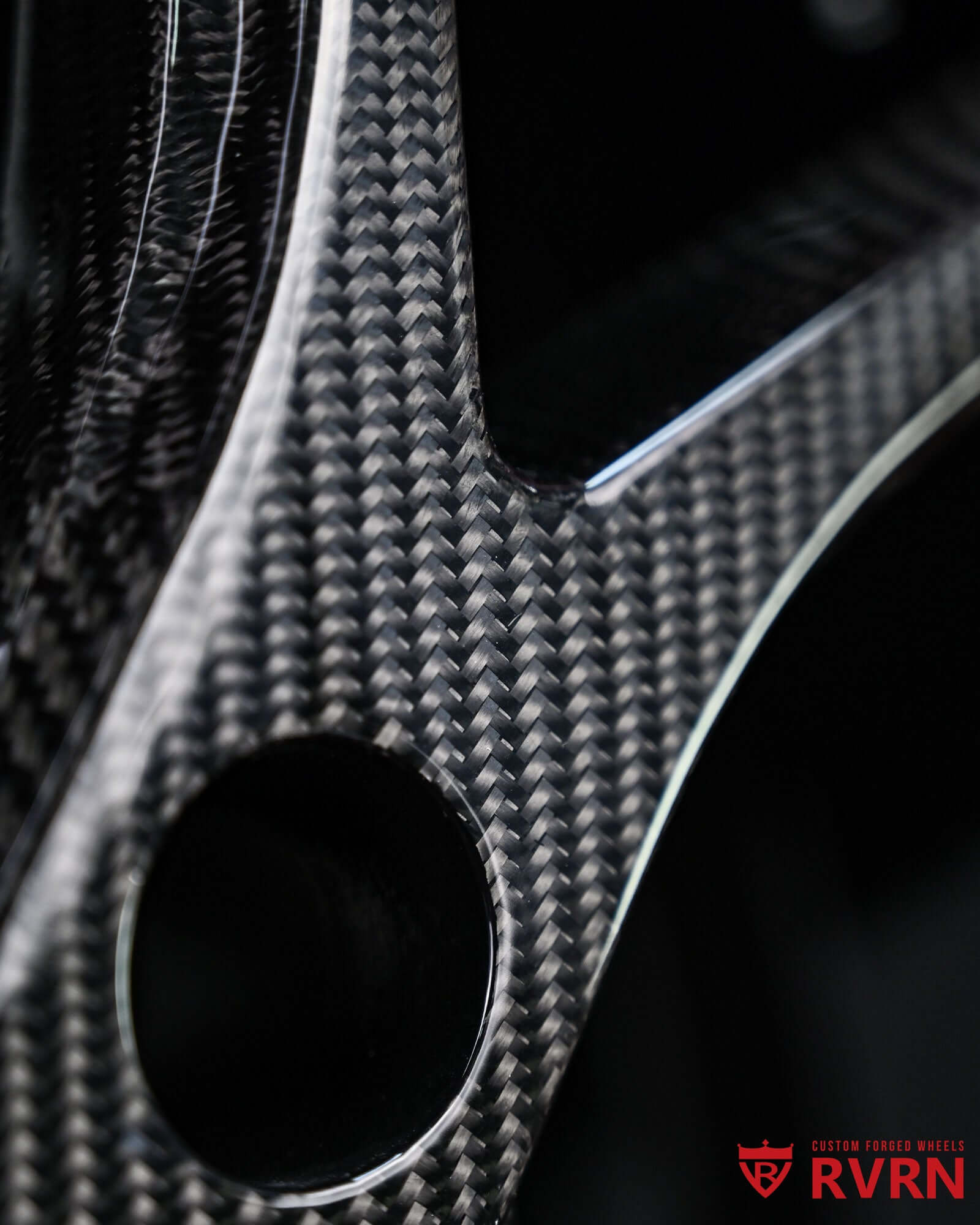 RVRN carbon fiber wrapped spoke detail on 21-inch custom wheels for Aston Martin V8 Vantage