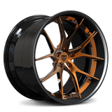 ston Martin wheels with a bronze finish, carbon fiber lip, deep dish concave style, custom-built to order for Vantage models.