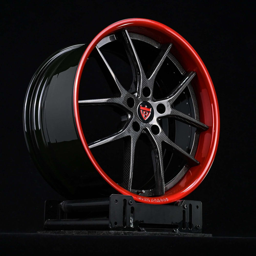 Deep dish design on RVRN 21x11 custom wheels for high-performance Aston Martin sports cars