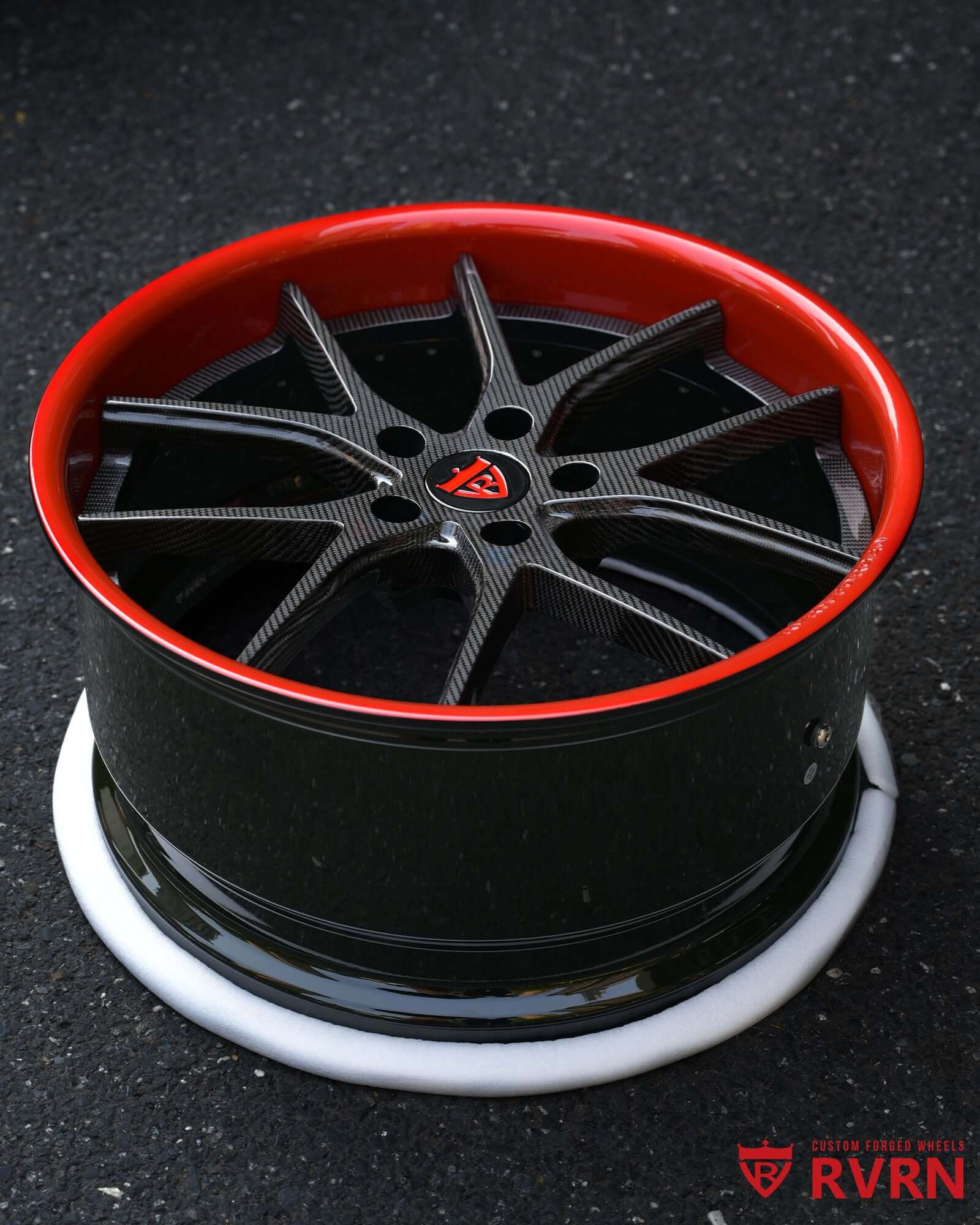 Striking red lip and black barrel finish on RVRN Vantage custom 21-inch wheels