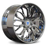 Custom forged 2-piece chrome wheel with intricate design and blue accents, ideal for Corvette C8 deep lip rims.