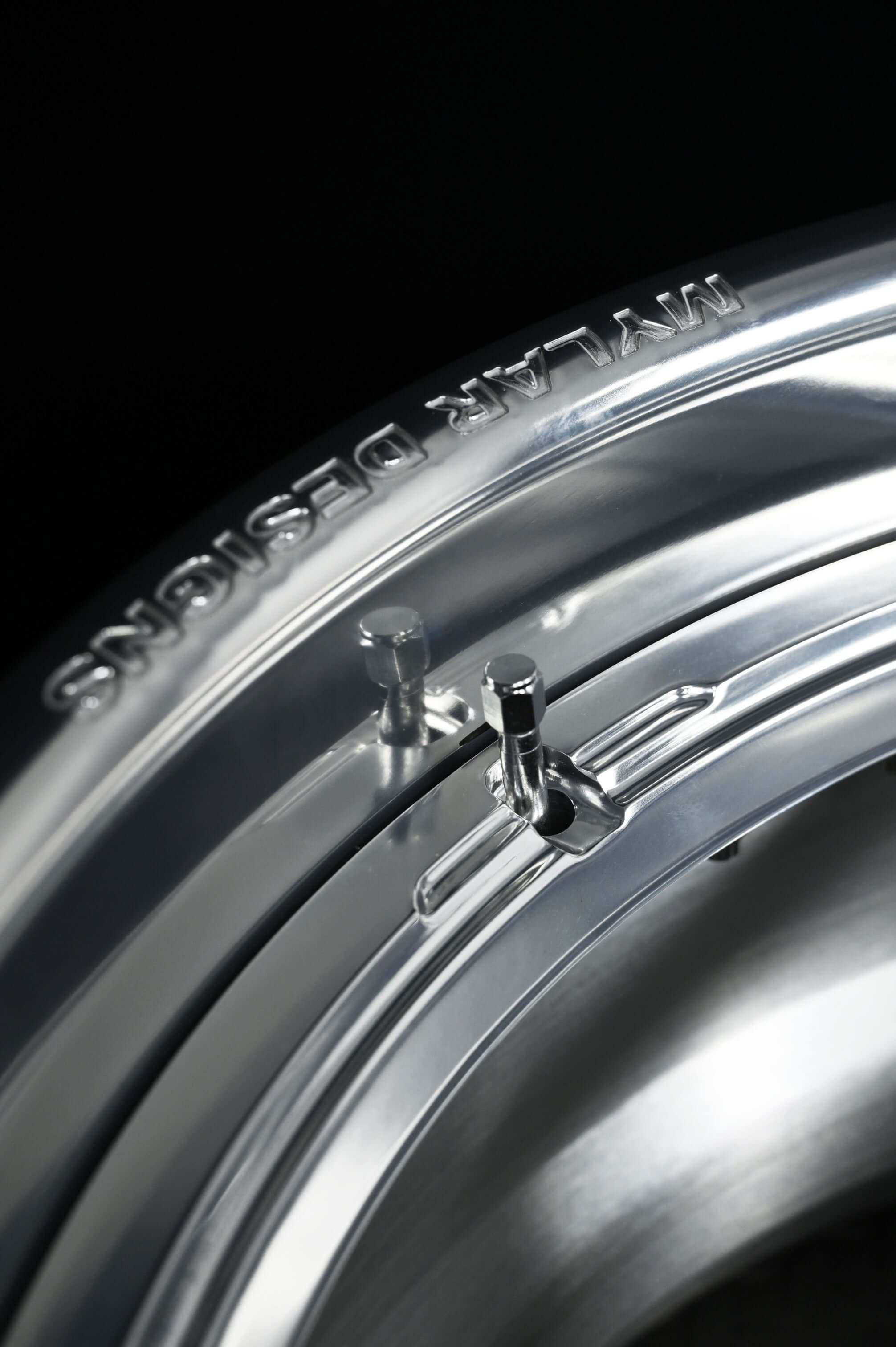 Close-up of forged Porsche Cayman wheels featuring a sleek design and deep lip, emphasizing custom 5 spoke rims.