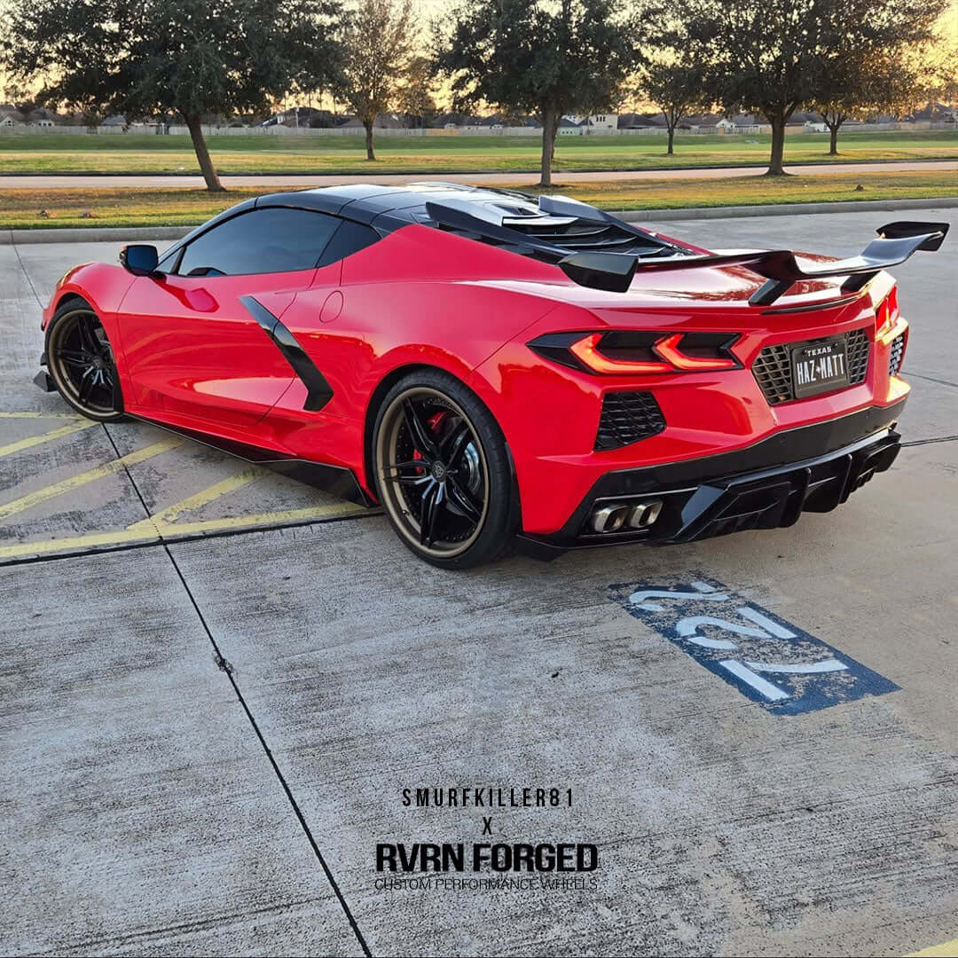 Custom Corvette C8 with forged 5 spoke wheels, showcasing a dynamic red color and sleek design.