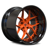 Close-up of custom deep dish rims for 1970 Dodge Charger, orange and black wheels