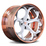Custom 2 piece forged wheels in white and copper finish, showcasing intricate design and lightweight construction.