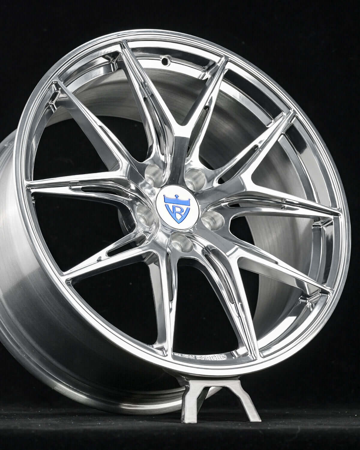 Detailed image of RVRN RV-MH051 wheels on a BMW 5 Series, showcasing hand-polished, mirror-like finish.