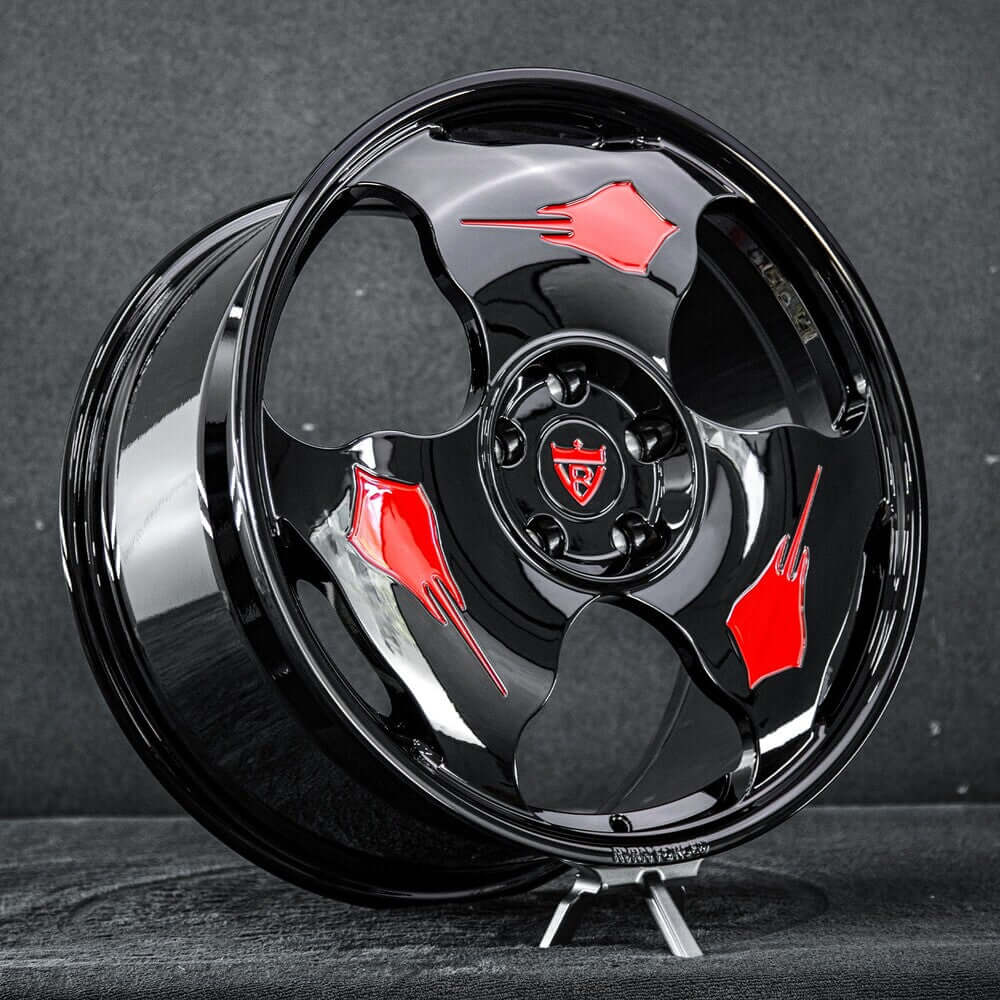 Custom forged monoblock Stingray wheel with black finish and red accents, designed for Corvette C7 vehicles.