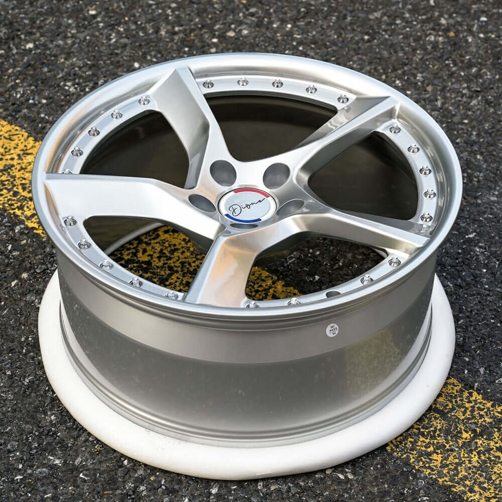 Custom forged monoblock wheel with 5 spokes and a polished silver finish, designed for high-performance vehicles.