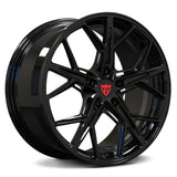 Custom forged black wheels with unique design for C7 Corvette aftermarket upgrades.