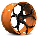 Custom forged monoblock wheel in orange and black finish, ideal for Corvette aftermarket rims and performance upgrades.