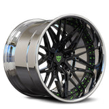 Side view of custom 2-piece black and chrome with green screws Jeep Wrangler wheel for an enhanced off-road appearance.