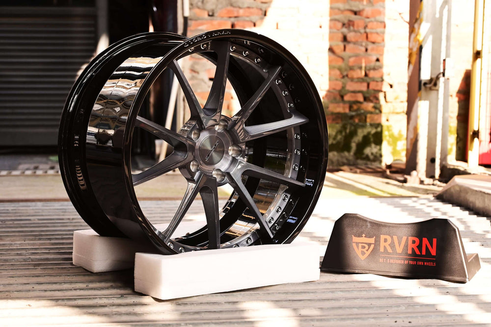 Front 19x10 RV-DC02 wheel on orange Corvette C7 Z06, offset optimized for super concave look, 10-spoke design, transparent black finish reflecting light.