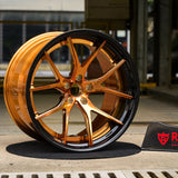 C8 Corvette bronze aftermarket wheel showcasing custom design for C8 Corvette enthusiasts.