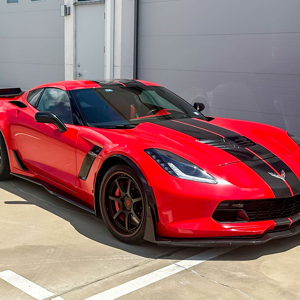 Red Corvette C7 Z06 featuring black custom forged wheels, showcasing a sleek aftermarket design.